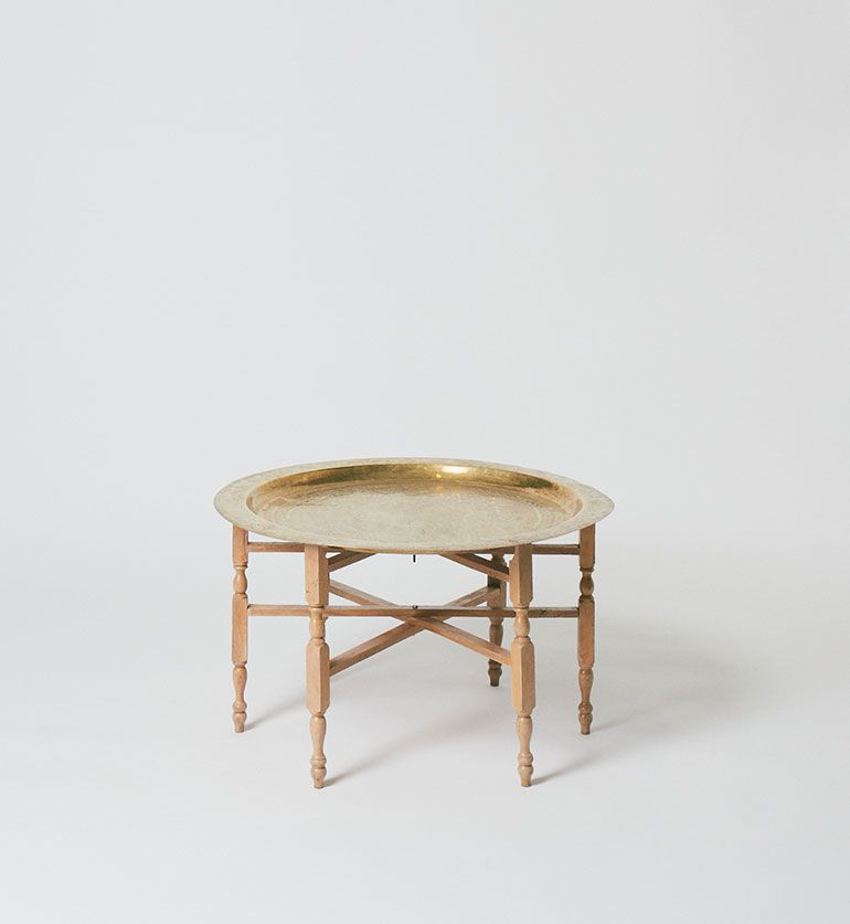 Table basse ronde dorée